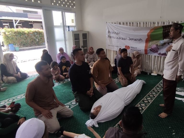 mengurus jenazah